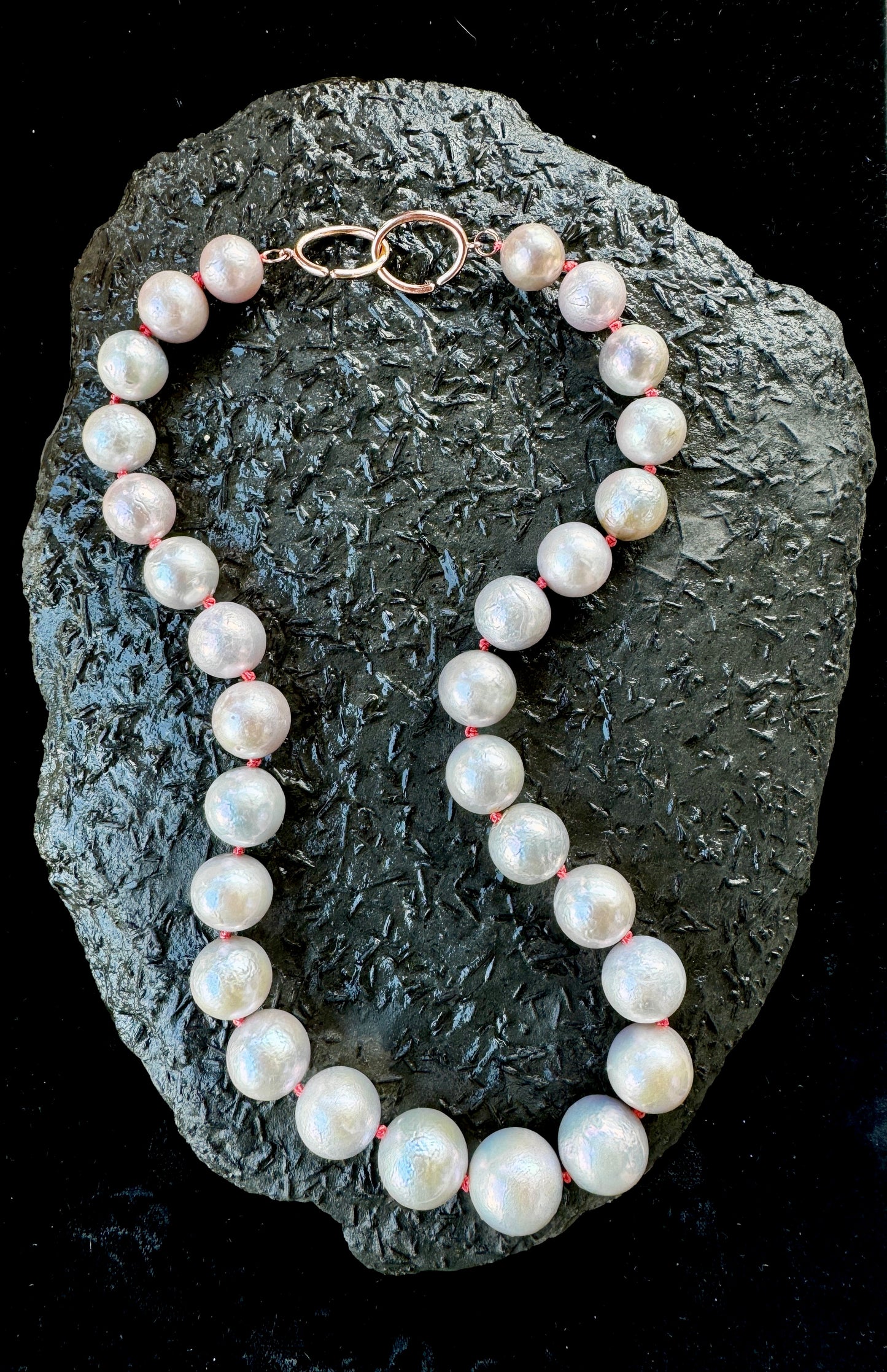 Juicy Freshwater Pearls with Bright Coral Knots